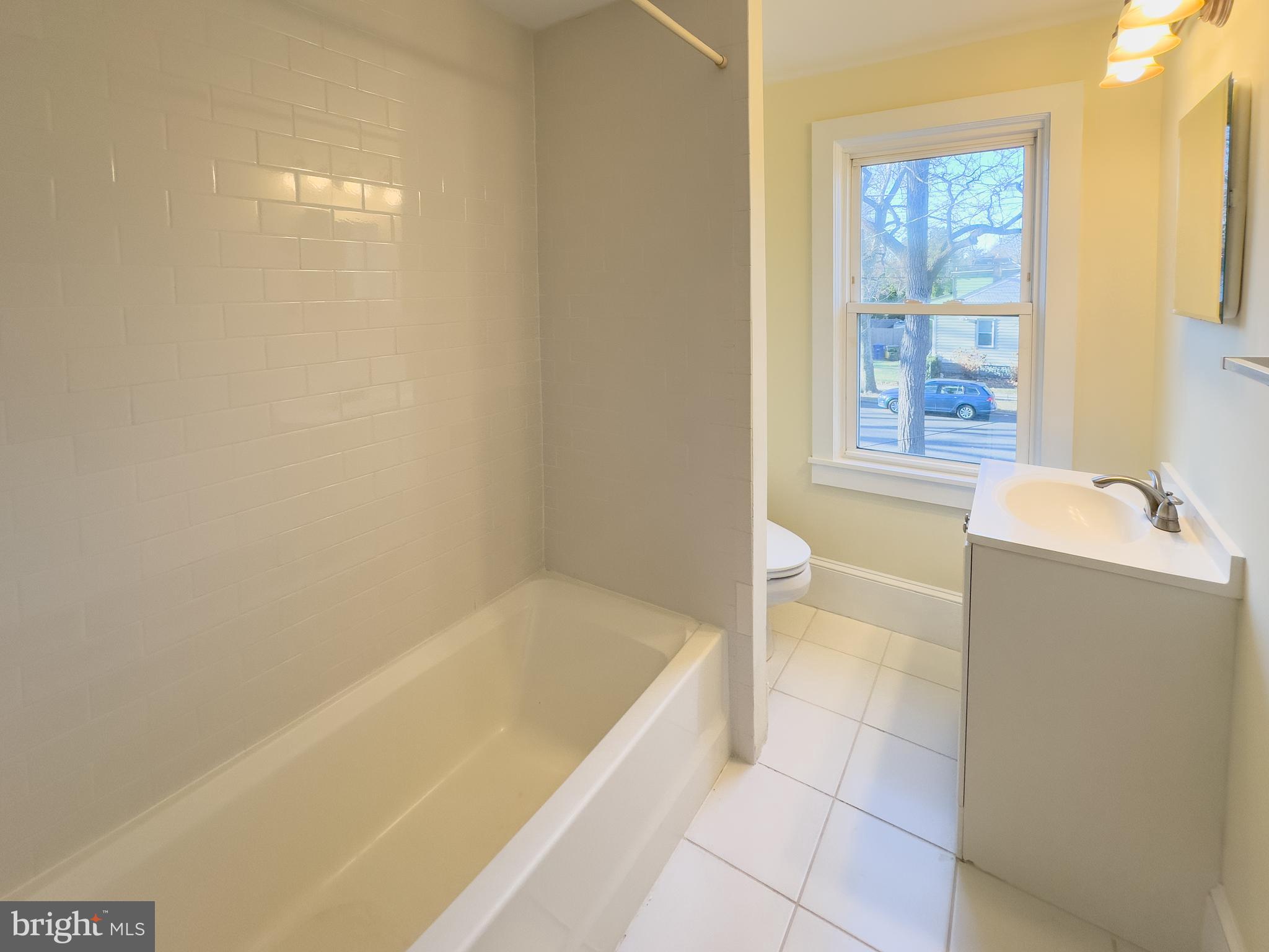 401 2nd Street Riverton, NJ 08077 - Photo 26 of 39 a bathroom with a bathtub and shower