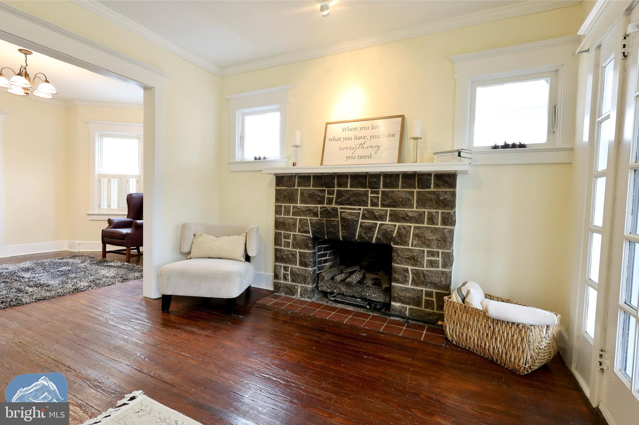 401 2nd Street Riverton, NJ 08077 - Photo 9 of 39 a living room with furniture and a fireplace