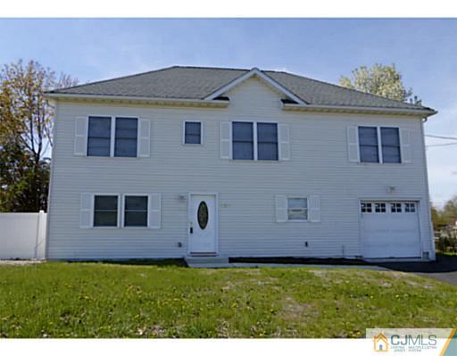 529 New Durham Road Piscataway, NJ 08854 - Photo 1 of 25 a house view with a garden space