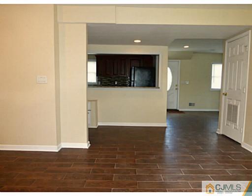 529 New Durham Road Piscataway, NJ 08854 - Photo 12 of 25 a view of a living room with a wooden floor