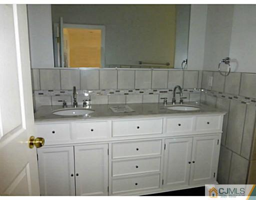 529 New Durham Road Piscataway, NJ 08854 - Photo 15 of 25 a view of white cabinets