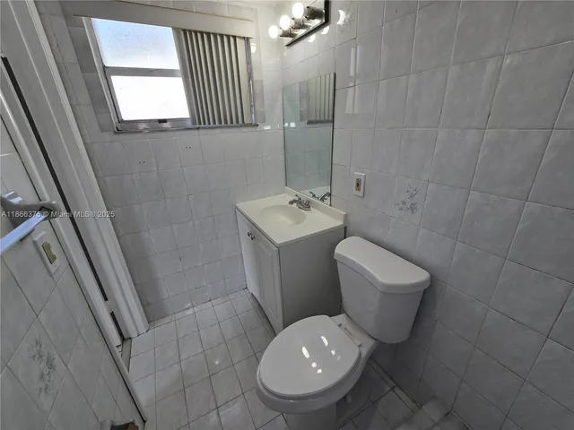 a view of house with swimming pool outdoor seating