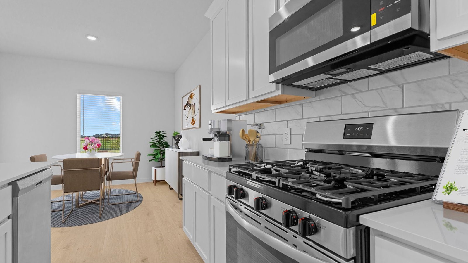 6108 Brookhaven Street Rosenberg, TX 77469 - Photo 11 of 40 a stove top oven sitting inside of a kitchen