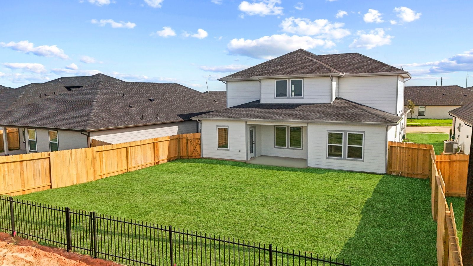 6108 Brookhaven Street Rosenberg, TX 77469 - Photo 24 of 40 a front view of a house with a yard