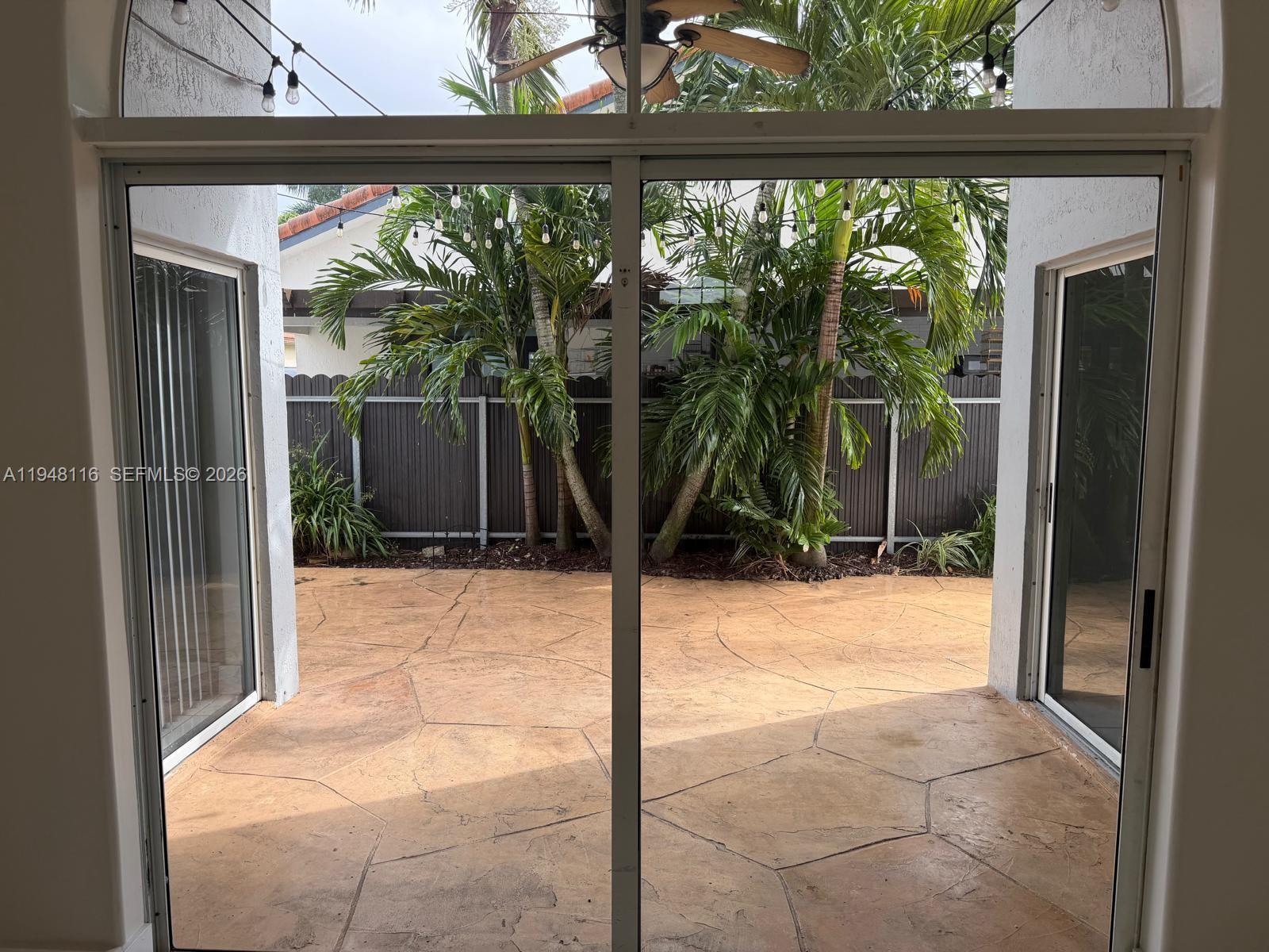 9125 Southwest 166th Avenue Miami, FL 33196 - Photo 22 of 25 a view of backyard from window