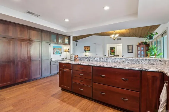 a bedroom with a bed and a mirror