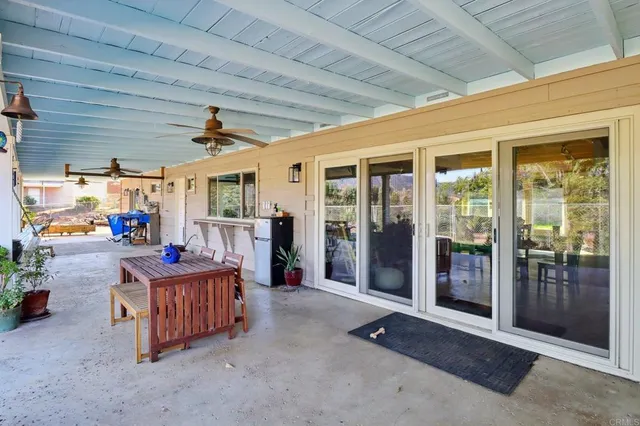 an aerial view of houses with outdoor space