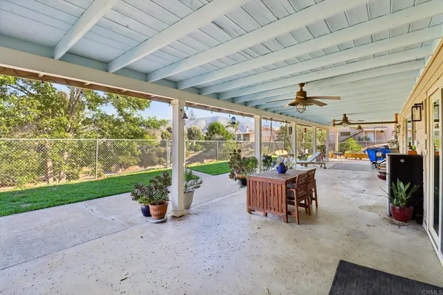 an aerial view of residential house and sandy dunes