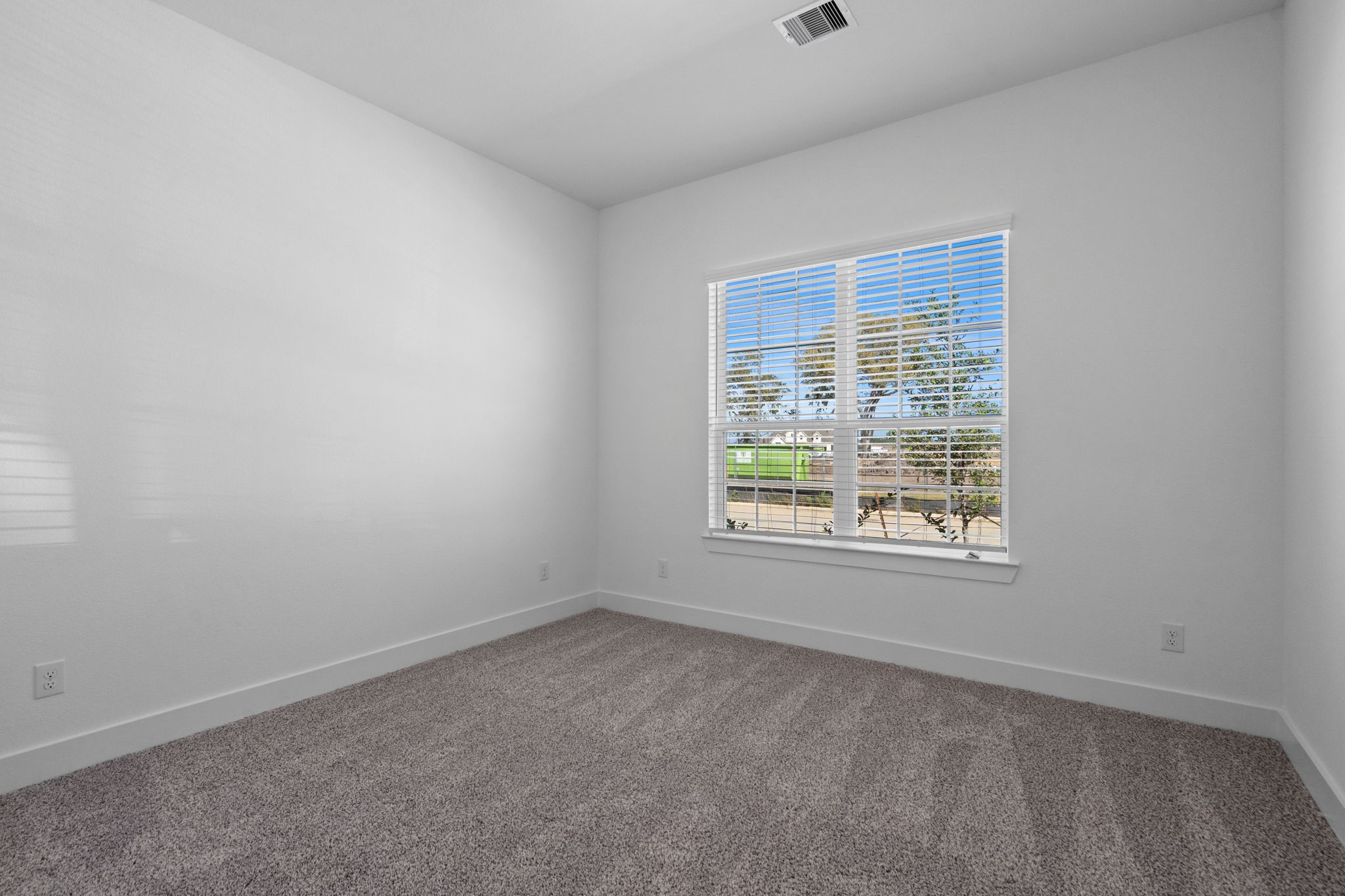 12002 Rice View Drive Mont Belvieu, TX 77523 - Photo 23 of 50 an empty room with a window
