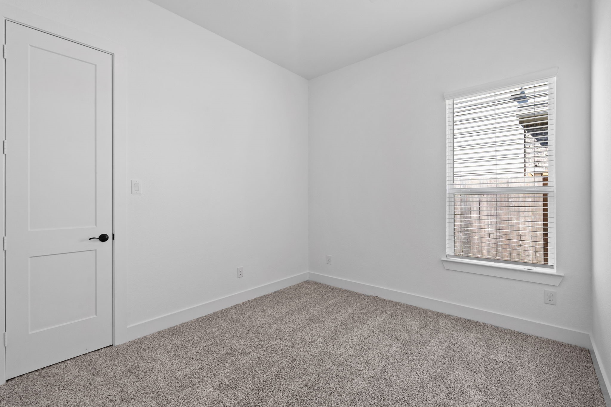 12002 Rice View Drive Mont Belvieu, TX 77523 - Photo 27 of 50 an empty room with a window