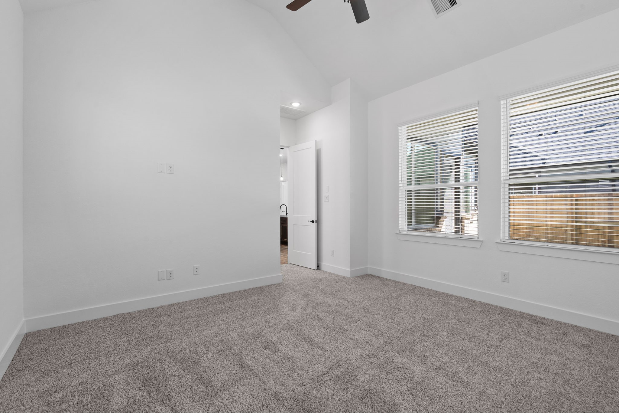 12002 Rice View Drive Mont Belvieu, TX 77523 - Photo 28 of 50 a view of an empty room with a window