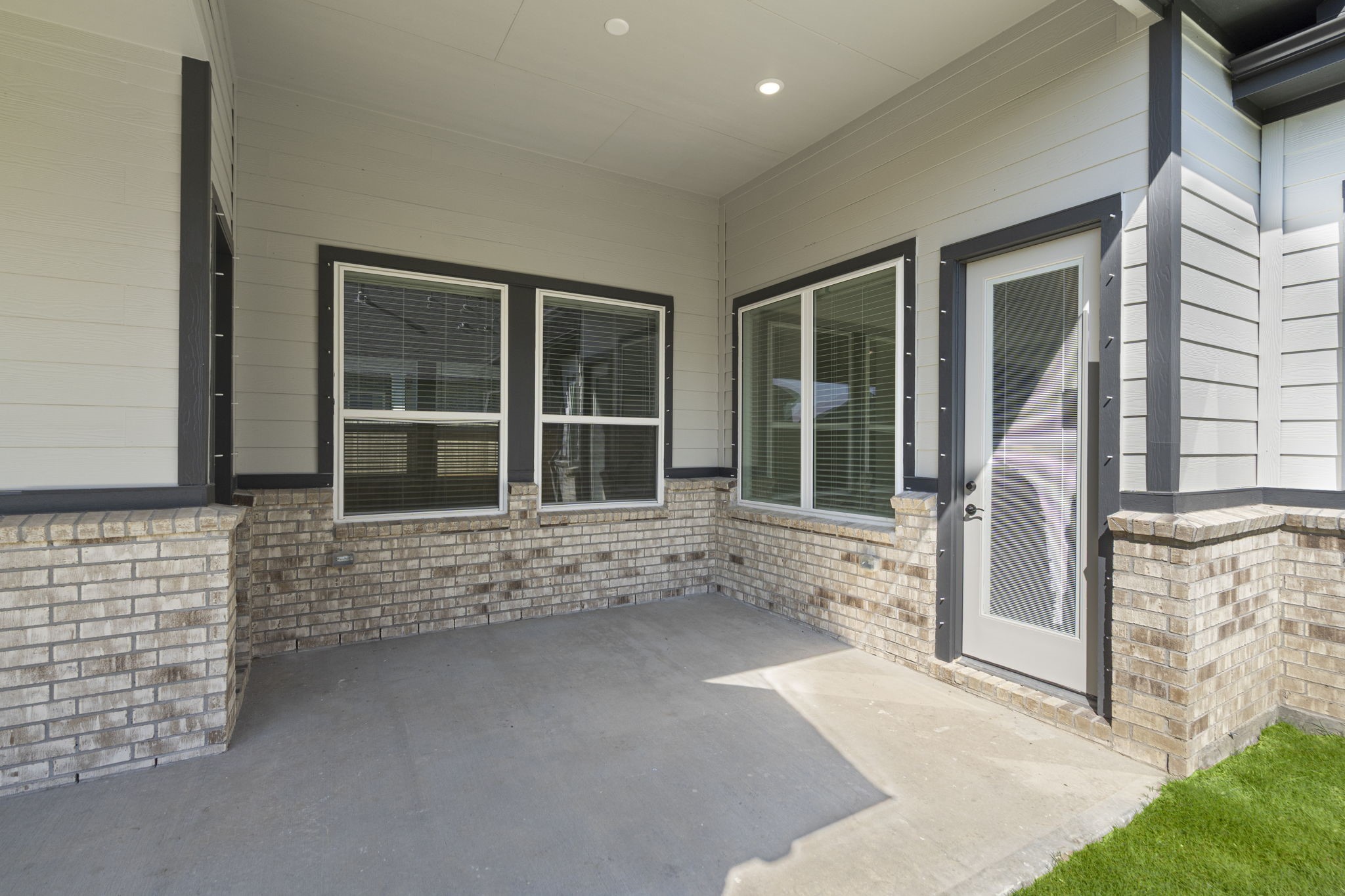 12002 Rice View Drive Mont Belvieu, TX 77523 - Photo 37 of 50 a view of front door of house with an outdoor space