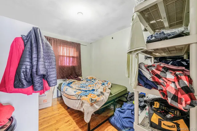 a bathroom with a sink a toilet and a window