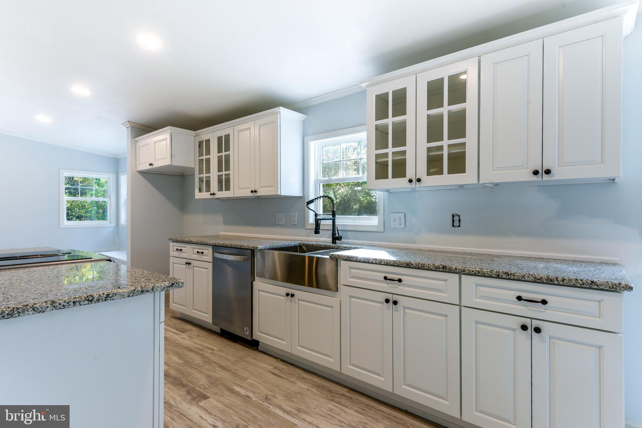 32474 Falling Point Road Dagsboro, DE 19939 - Photo 15 of 46 Beautiful cabinets and granite counter tops.
