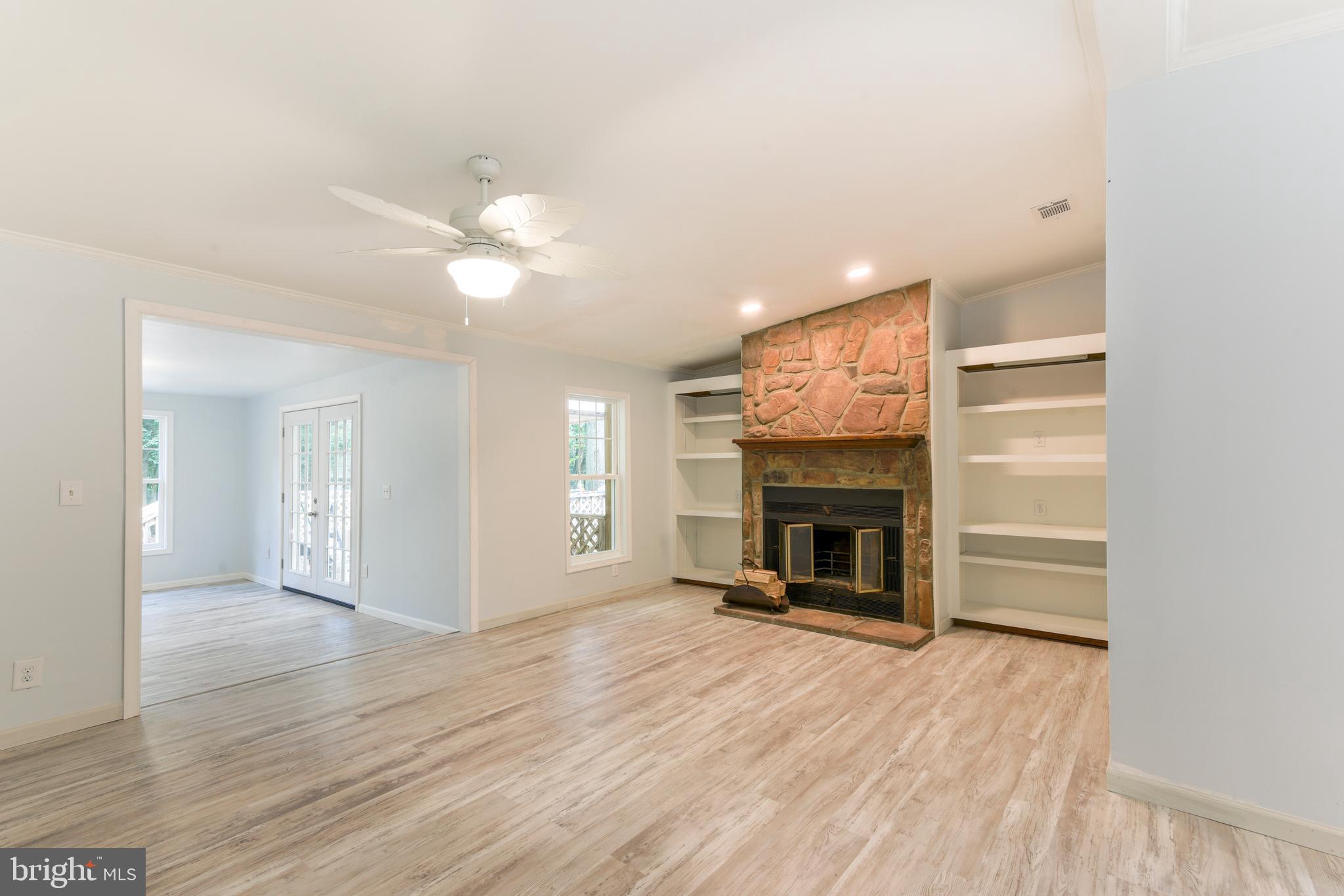 32474 Falling Point Road Dagsboro, DE 19939 - Photo 20 of 46 Enjoy this den off of the kitchen, wood burning FP