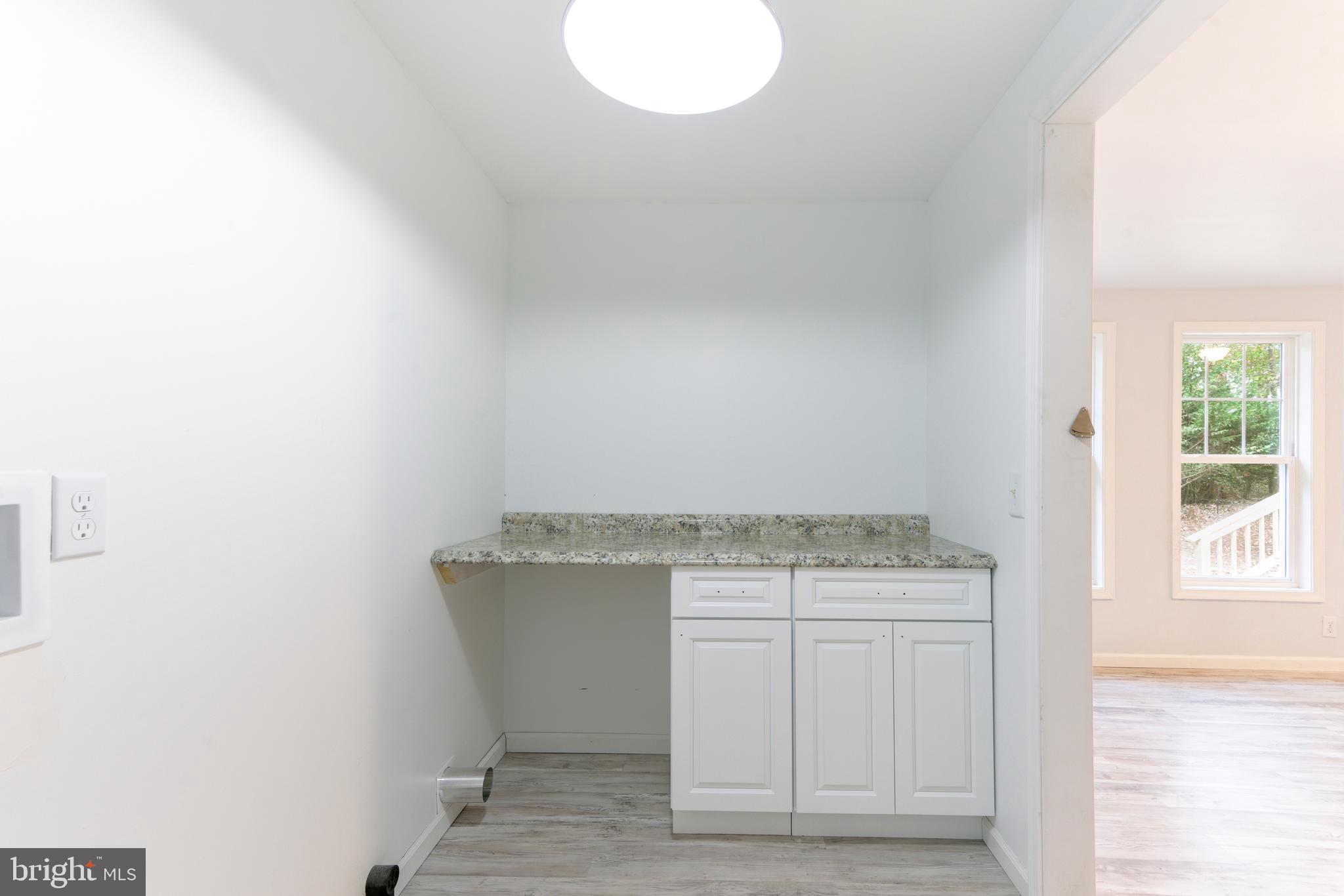 32474 Falling Point Road Dagsboro, DE 19939 - Photo 25 of 46 Laundry room with plenty of storage. W/D hookup.