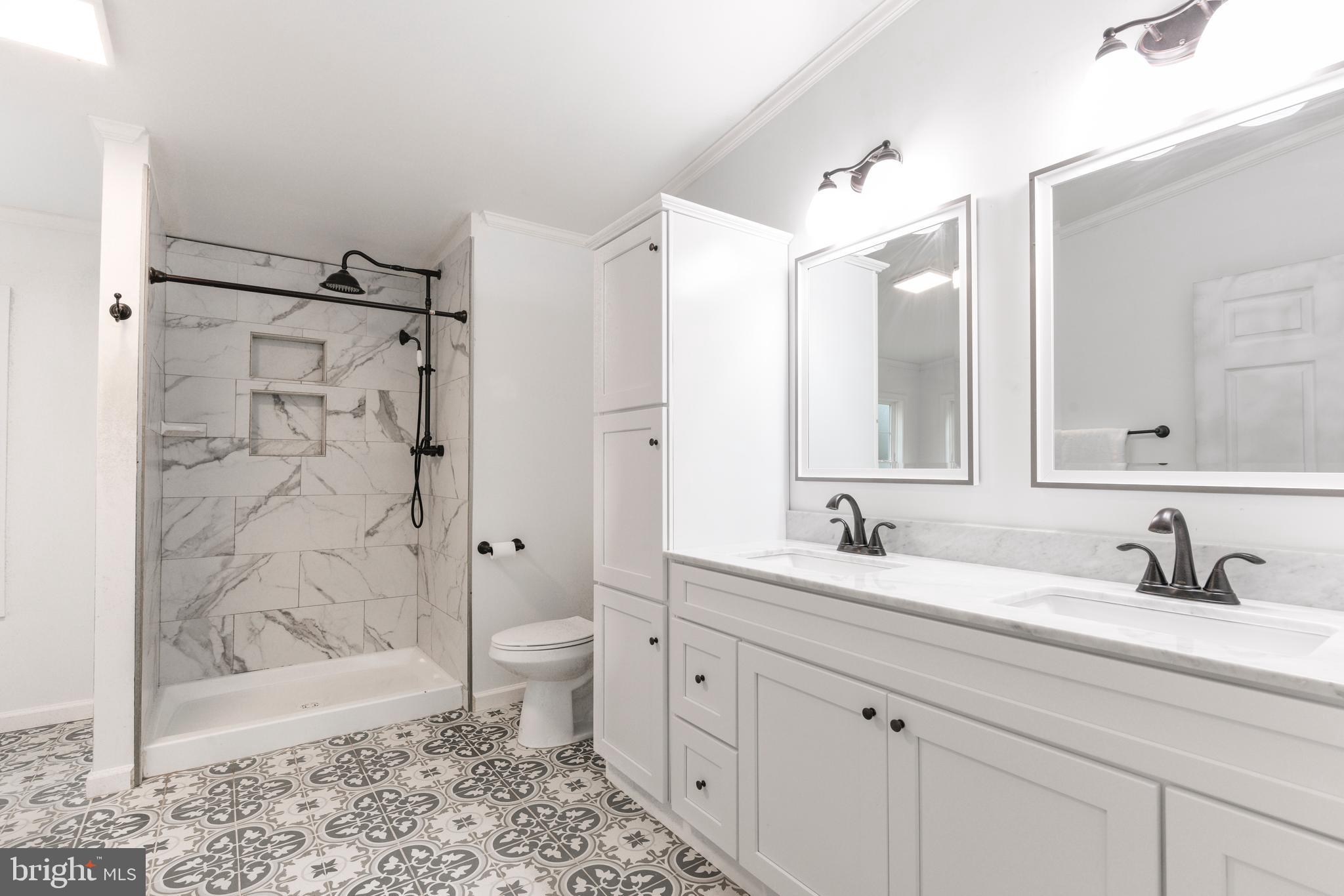 32474 Falling Point Road Dagsboro, DE 19939 - Photo 31 of 46 Master bath with double vanity, shower and tub.