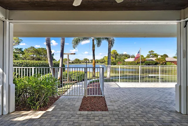 a large bathroom with a large mirror and sink