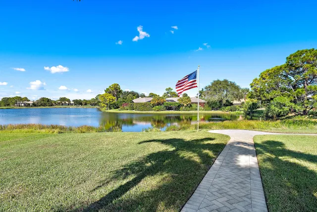 a white bath tub sitting next to a white toilet