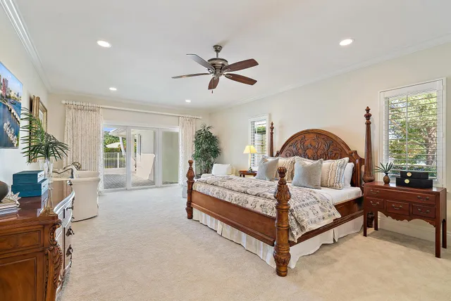 a bedroom with furniture and a window