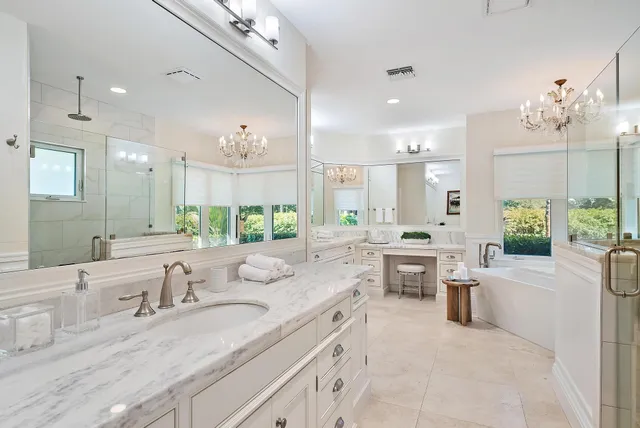 a spacious bedroom with a bed and a couch