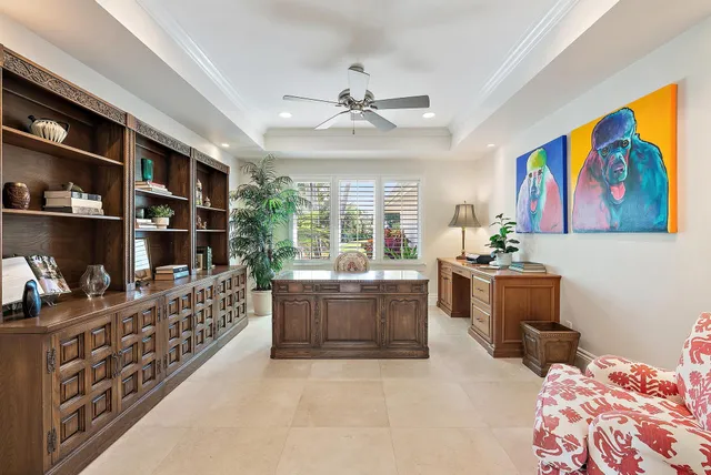 a bathroom with a granite countertop sink a toilet and a mirror