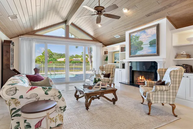 a kitchen with center island and windows