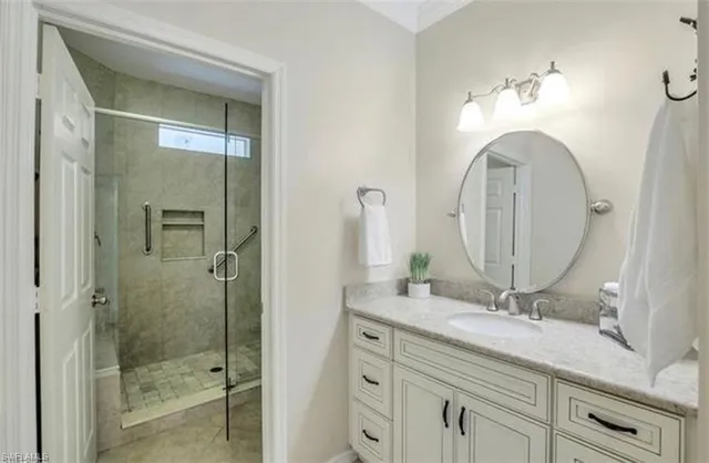 a bathroom with a double vanity sink and a mirror