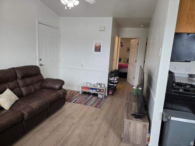343 300 North, Unit 9 Provo, UT 84601 - Photo 4 of 10 Living room with light wood finished floors