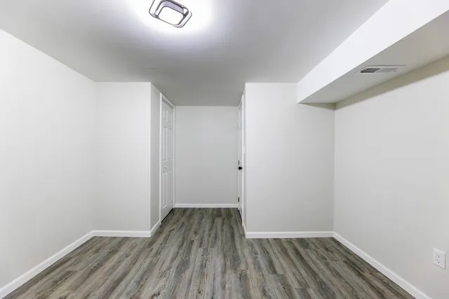 a view of small space with wooden floor