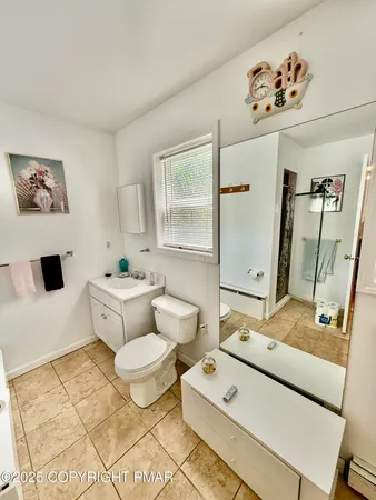 a view of a house with a yard and a garden