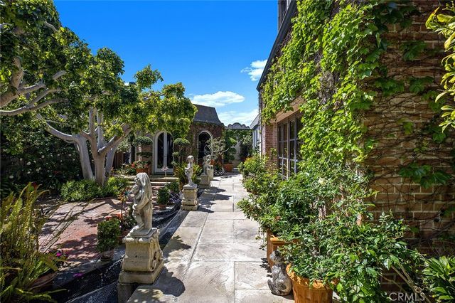 a view of yard with patio