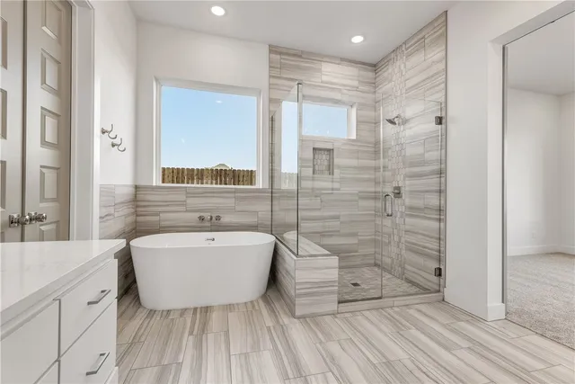 a bathroom with a double vanity sink and mirror