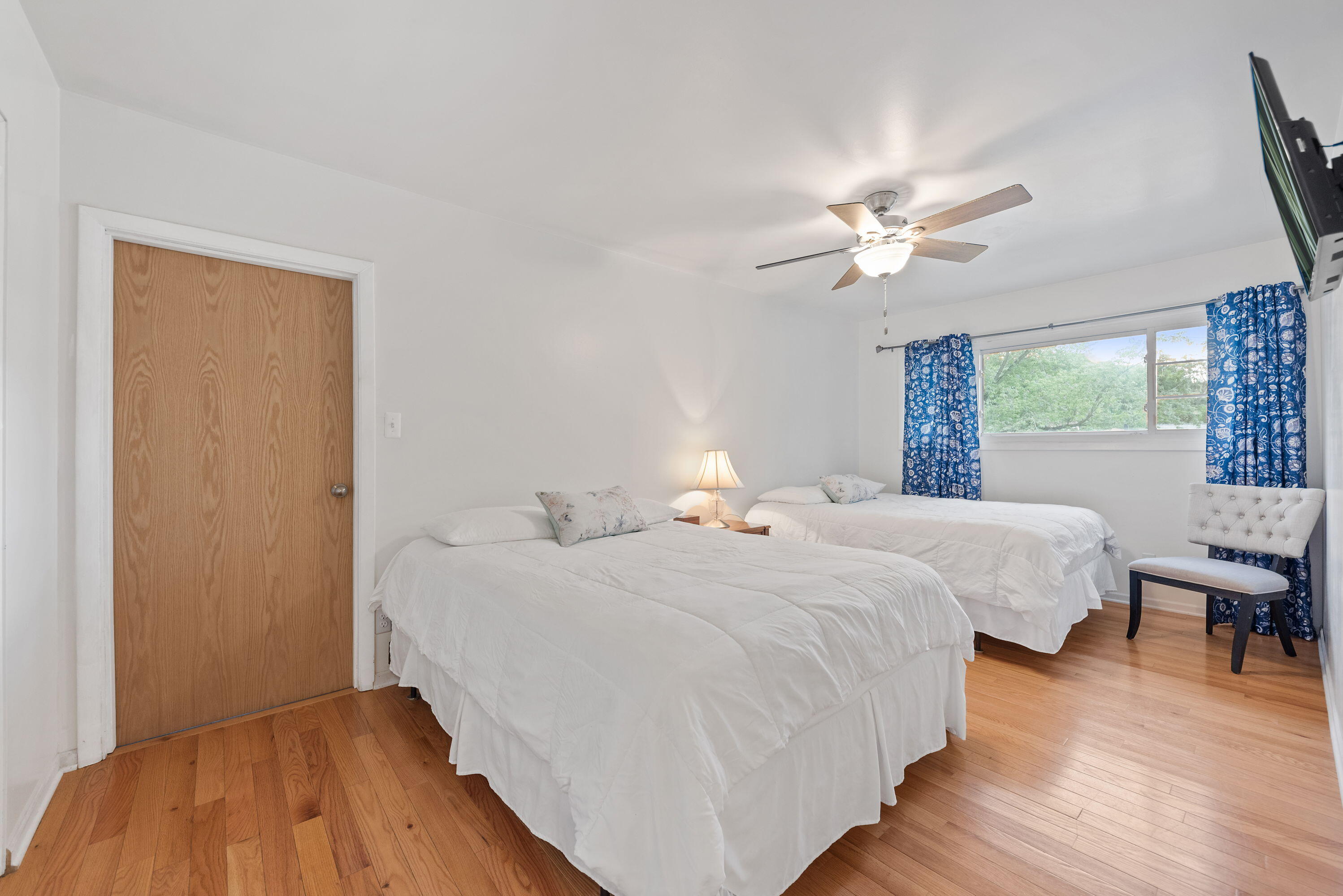 551 Union Place Gary, IN 46403 - Photo 16 of 19 a bedroom with two beds and a chandelier