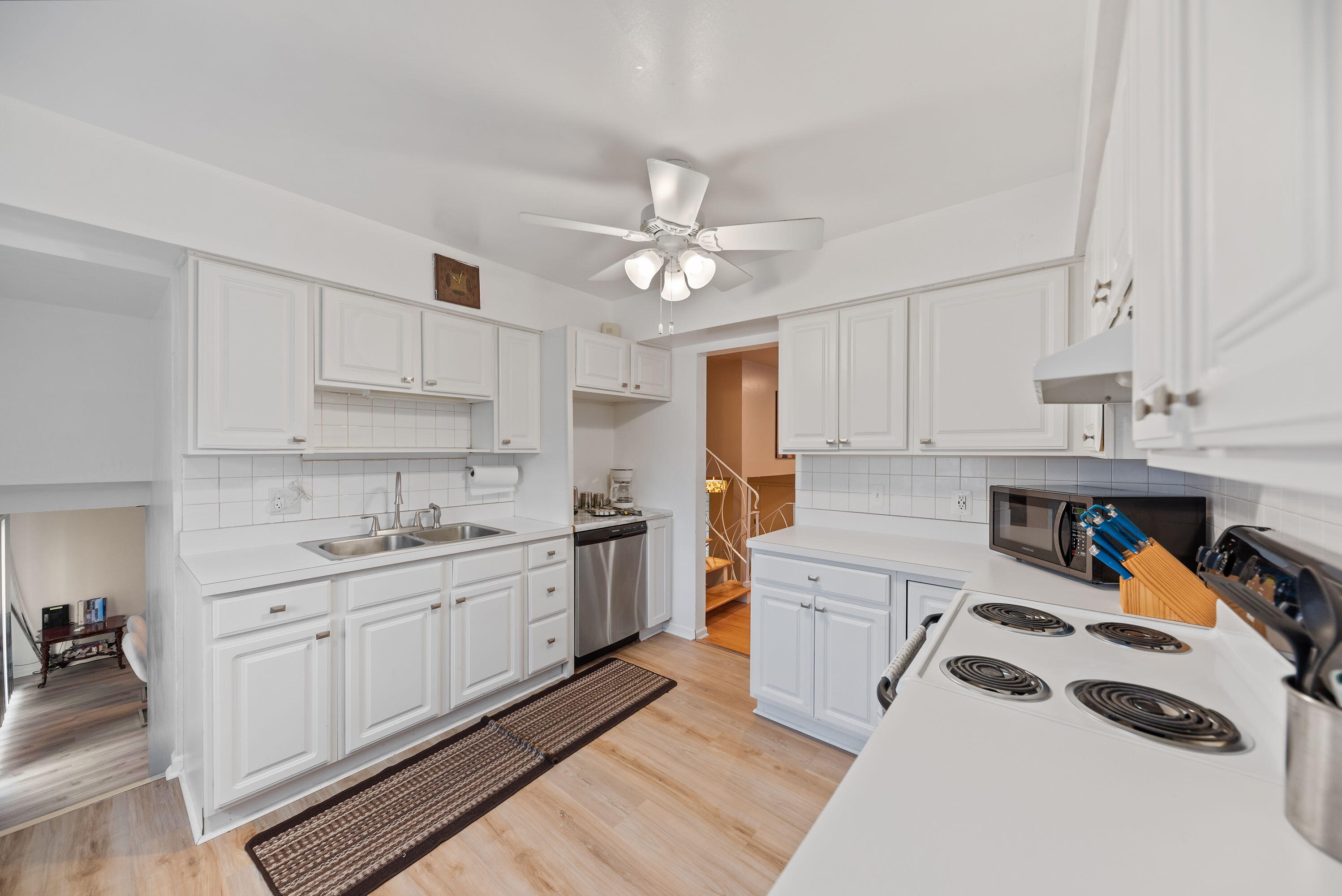 551 Union Place Gary, IN 46403 - Photo 10 of 19 a kitchen with a sink a stove a refrigerator and cabinets