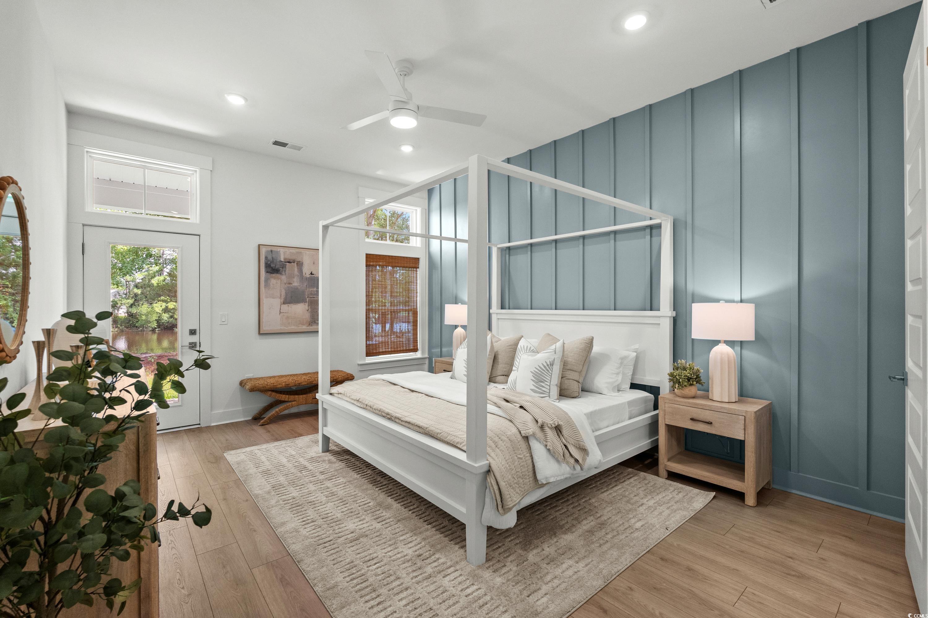 894 Foxtail Drive, Unit D41 Longs, SC 29568 - Photo 14 of 34 Living room with wooden walls, light wood finished floors, a ceiling fan, recessed lighting, and high vaulted ceiling