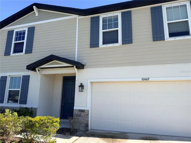 a view of a house with garage