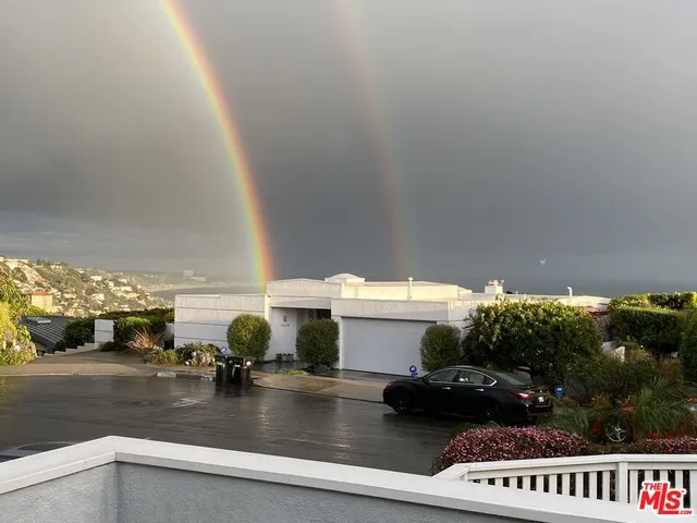 a view of swimming pool with outdoor seating