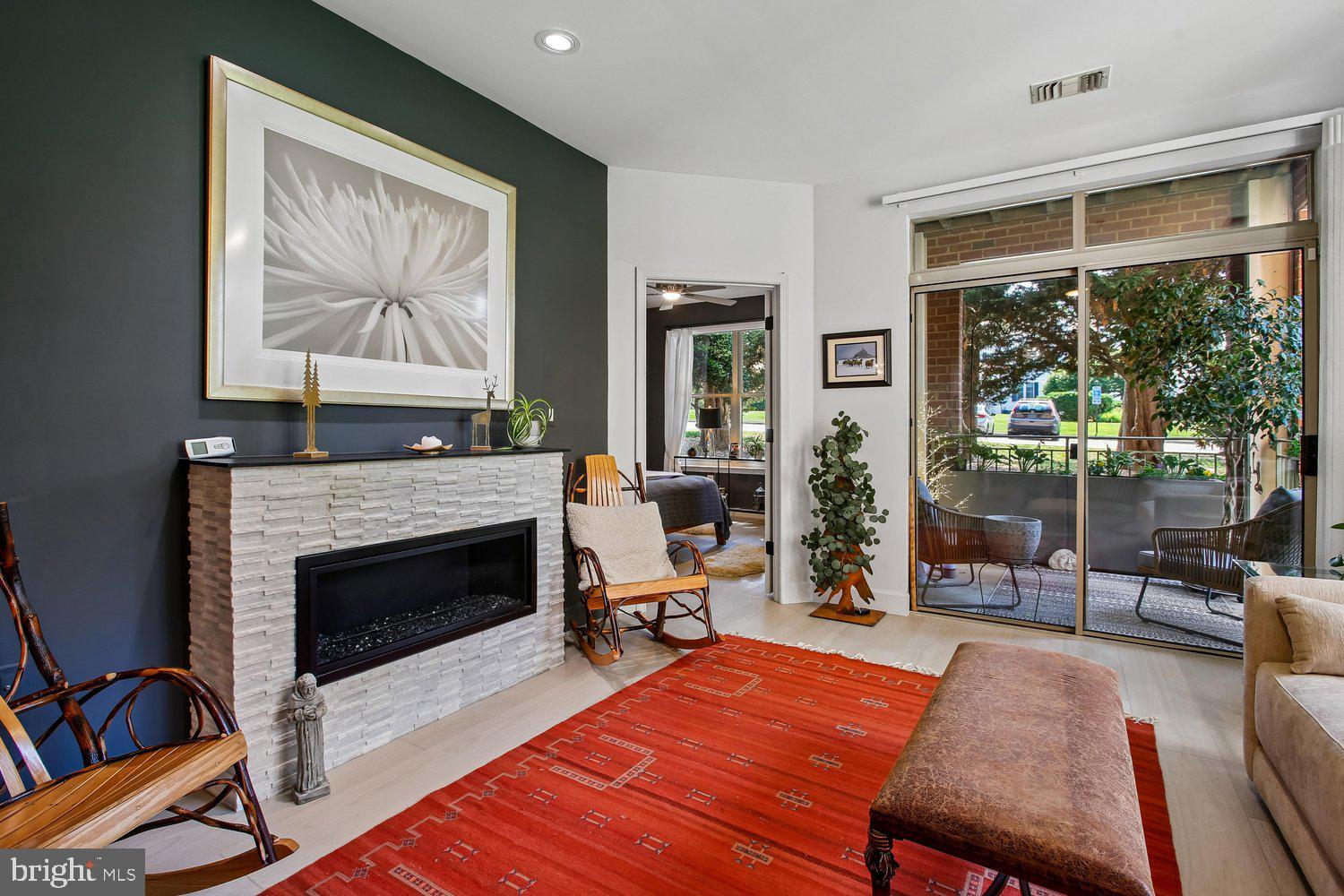 1855 Stratford Park Place, Unit 103 Reston, VA 20190 - Photo 19 of 49 Updated gas fireplace with remote.