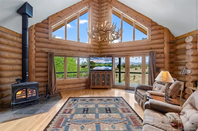 a living room with furniture and a rug