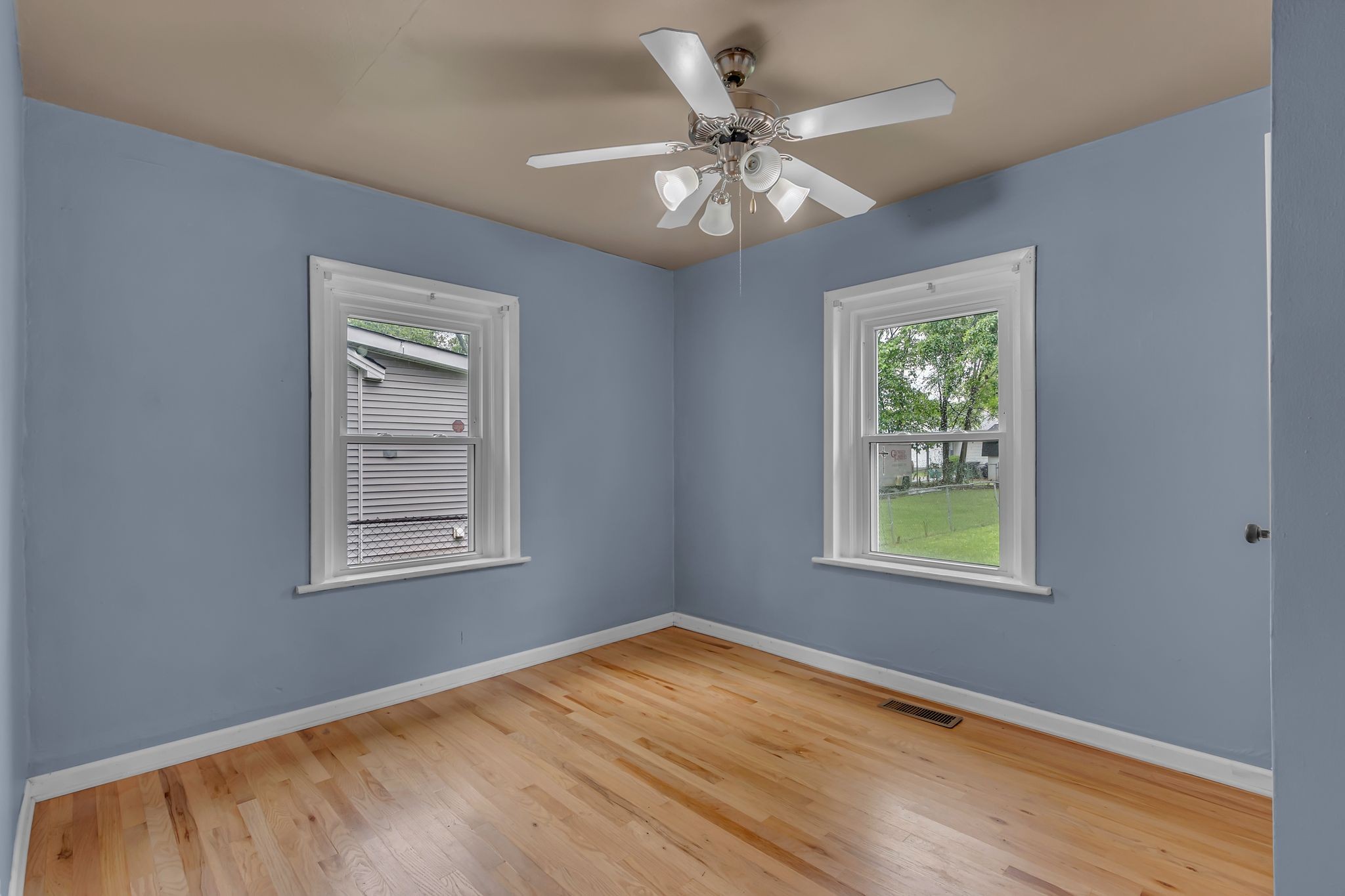 154 Morningside Lane Columbia, TN 38401 - Photo 12 of 26 a view of an empty room with wooden floor and a window