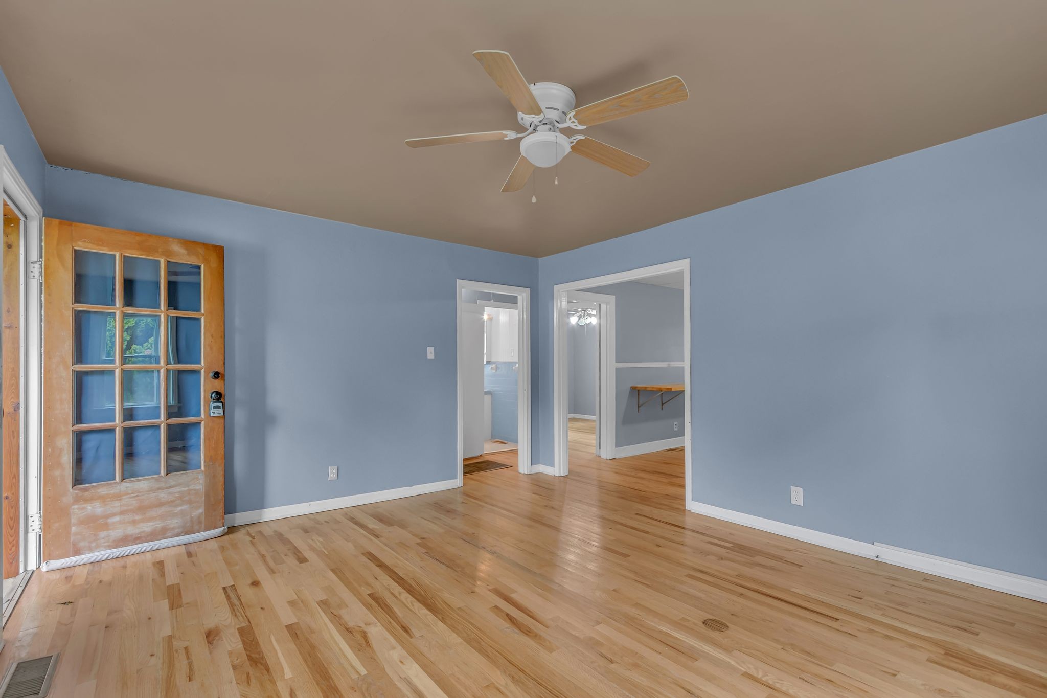 154 Morningside Lane Columbia, TN 38401 - Photo 13 of 26 a view of an empty room with wooden floor and a window