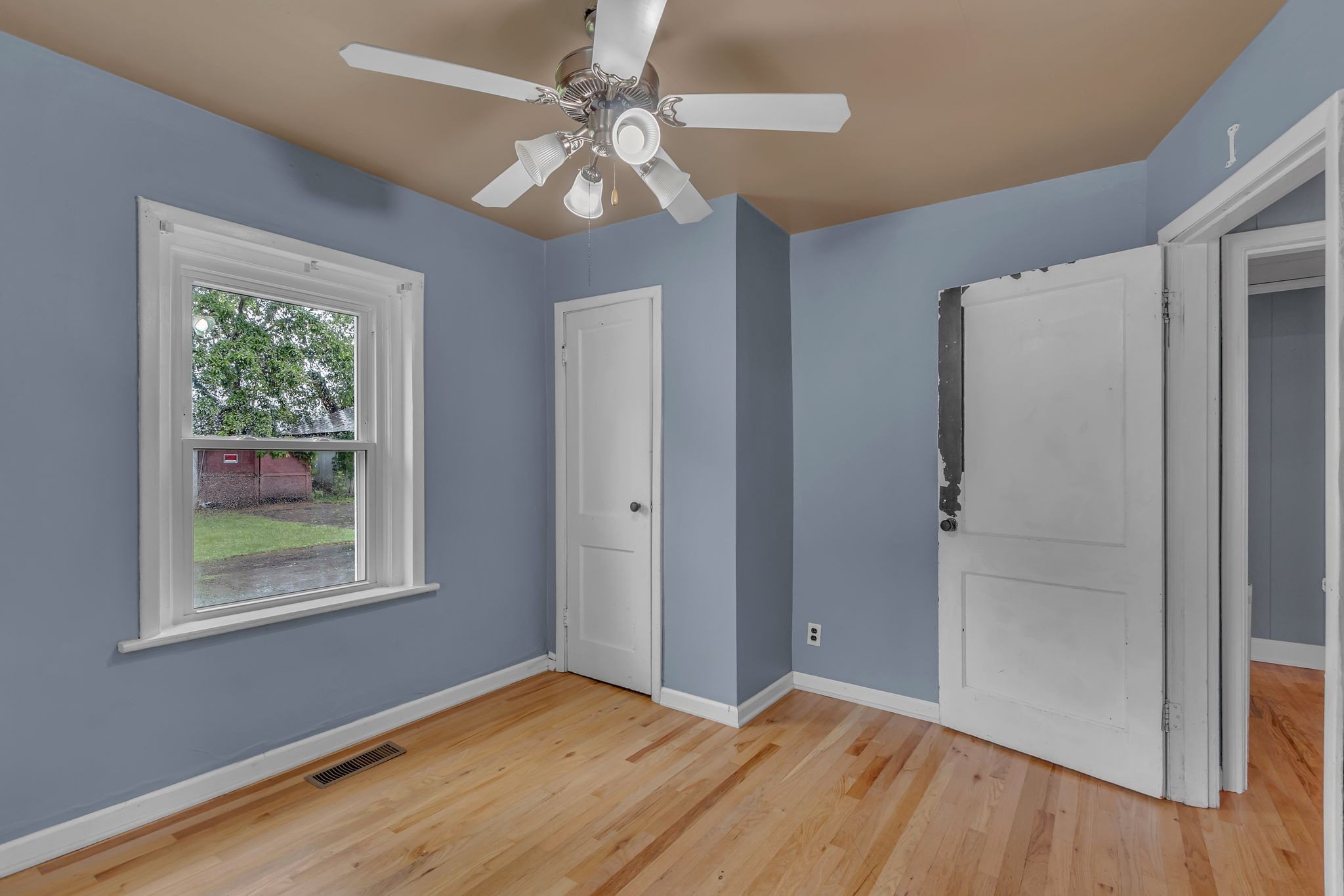 154 Morningside Lane Columbia, TN 38401 - Photo 19 of 26 a view of an empty room with wooden floor and a window