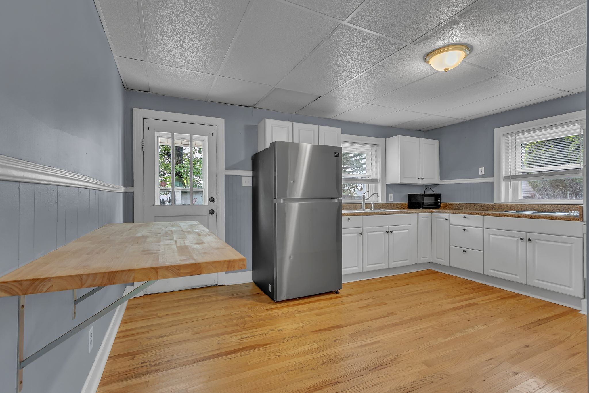 154 Morningside Lane Columbia, TN 38401 - Photo 8 of 26 a kitchen with a refrigerator and a sink