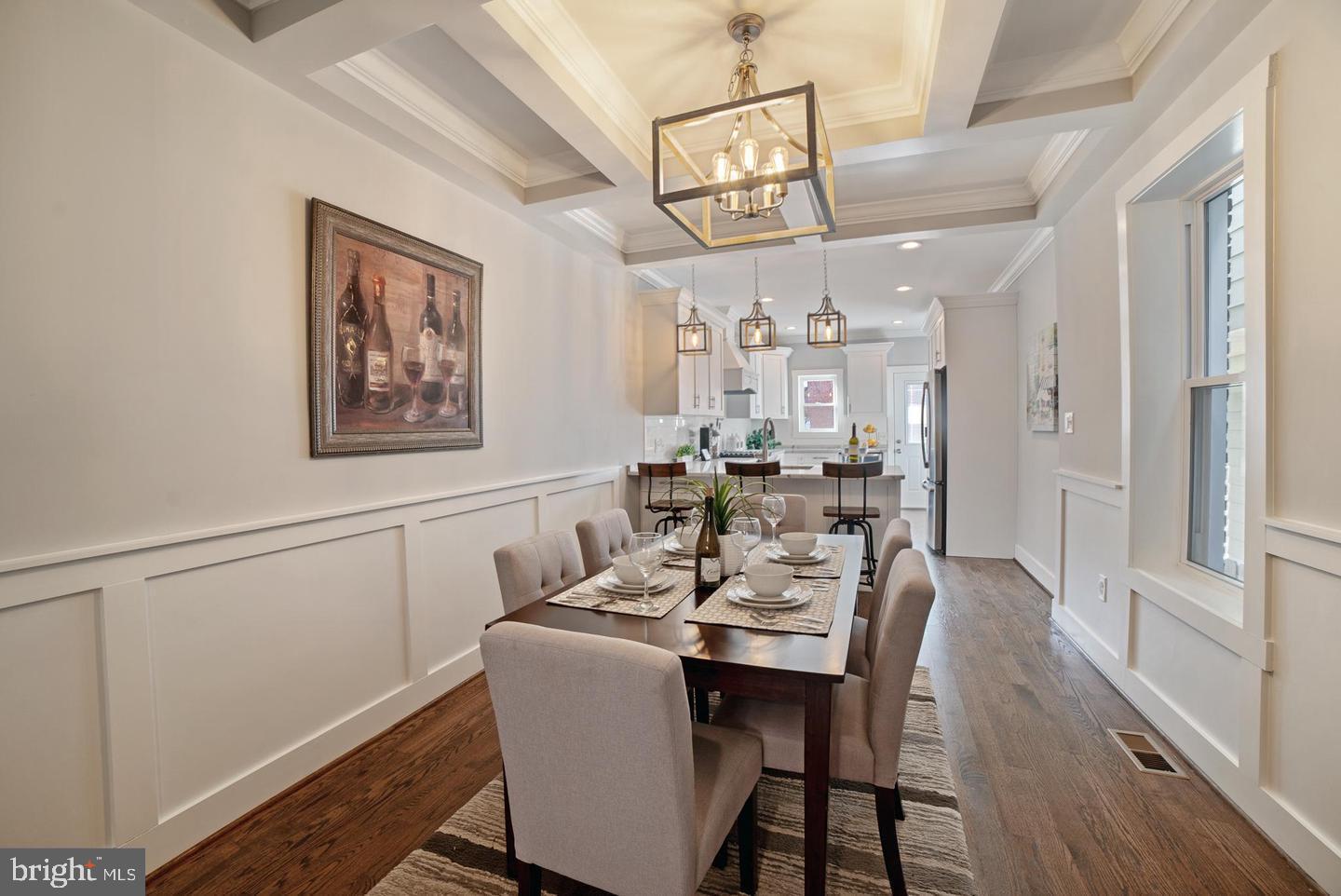 3425 O Donnell Street Baltimore, MD 21224 - Photo 1 of 29 a view of a dining room with furniture a chandelier and wooden floor