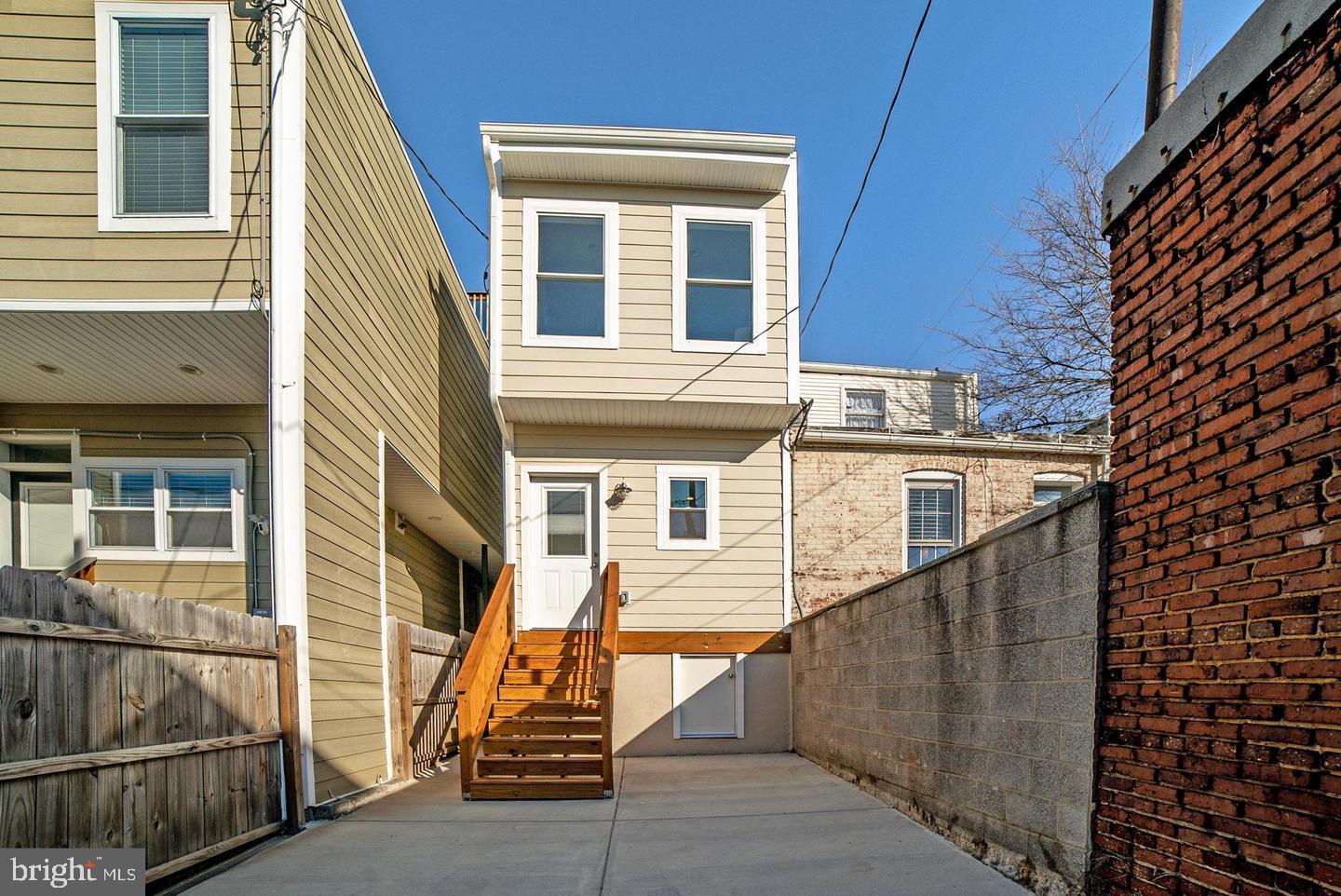 3425 O Donnell Street Baltimore, MD 21224 - Photo 26 of 29 a view of a house with wooden fence