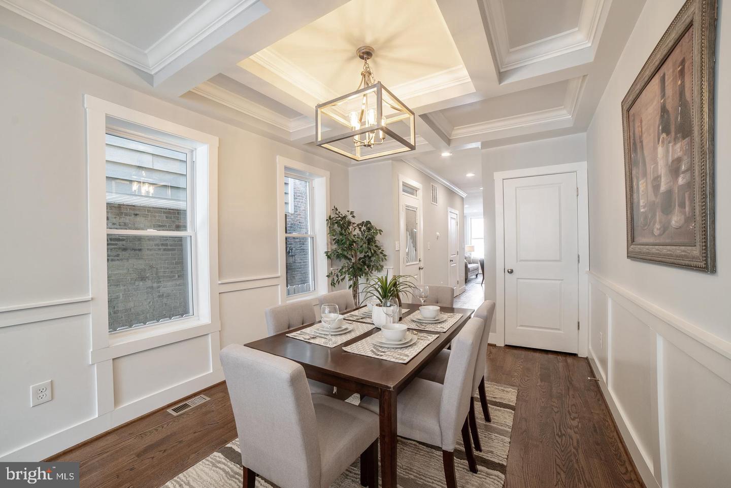 3425 O Donnell Street Baltimore, MD 21224 - Photo 5 of 29 a view of a dining room with furniture window and wooden floor
