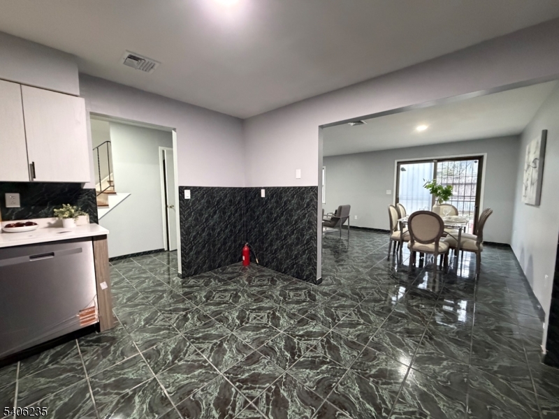 327 Bond Street Elizabeth Port, NJ 07206 - Photo 7 of 22 a view of living room and window