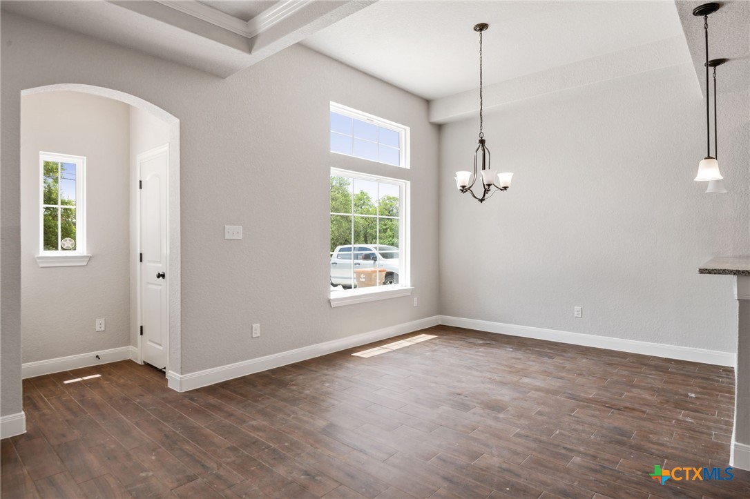 192 Weatherby Drive Spring Branch, TX 78070 - Photo 11 of 24 wooden floor in an empty room with a window