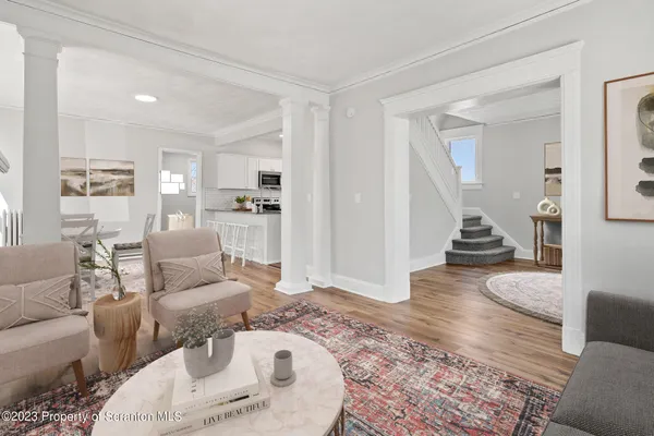 a view of fireplace with wooden floor